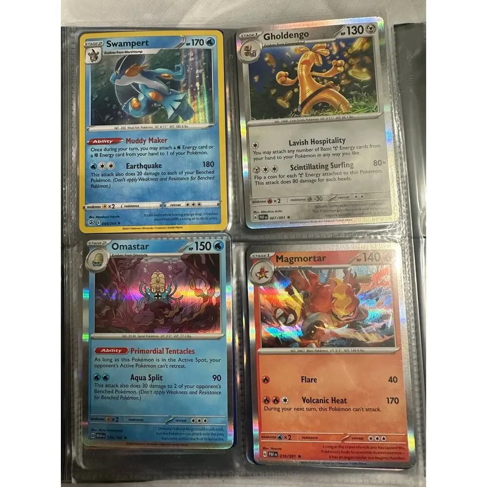 Lot of 80 holographic rare Pokemon cards.